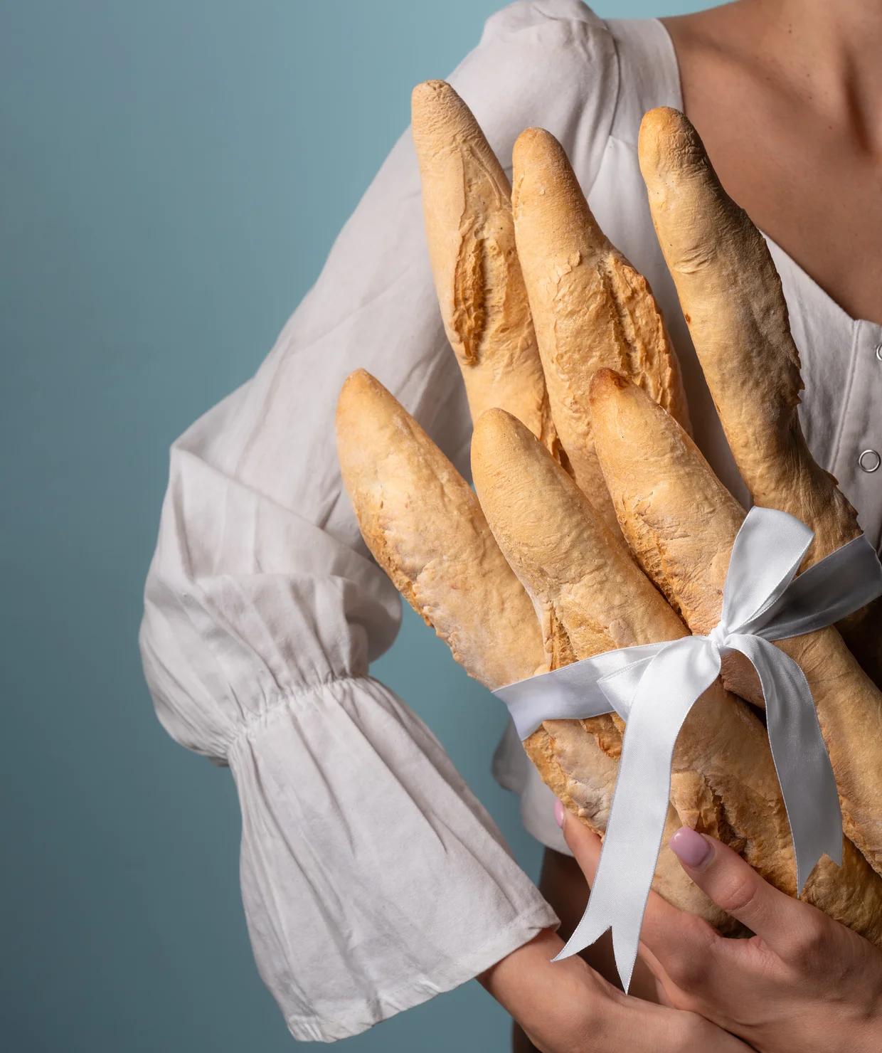Fresh baguettes tied with a ribbon